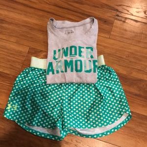 Under Armor shorts and shirt.